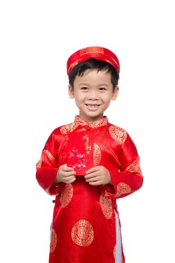 Kırmızı tutan küçük Vietnamlı çocuk Tet için zarf. Word mea