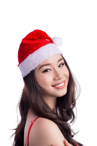 Mujer de Navidad. Belleza asiática modelo chica en santa hat aislado en blanco fondo —  Fotos de Stock