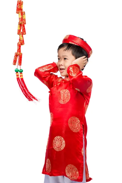 Exciting Vietnamese boy with firecrackers — Stock Photo, Image