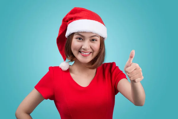 Ázsiai nő visel karácsonyi santa kalap — Stock Fotó