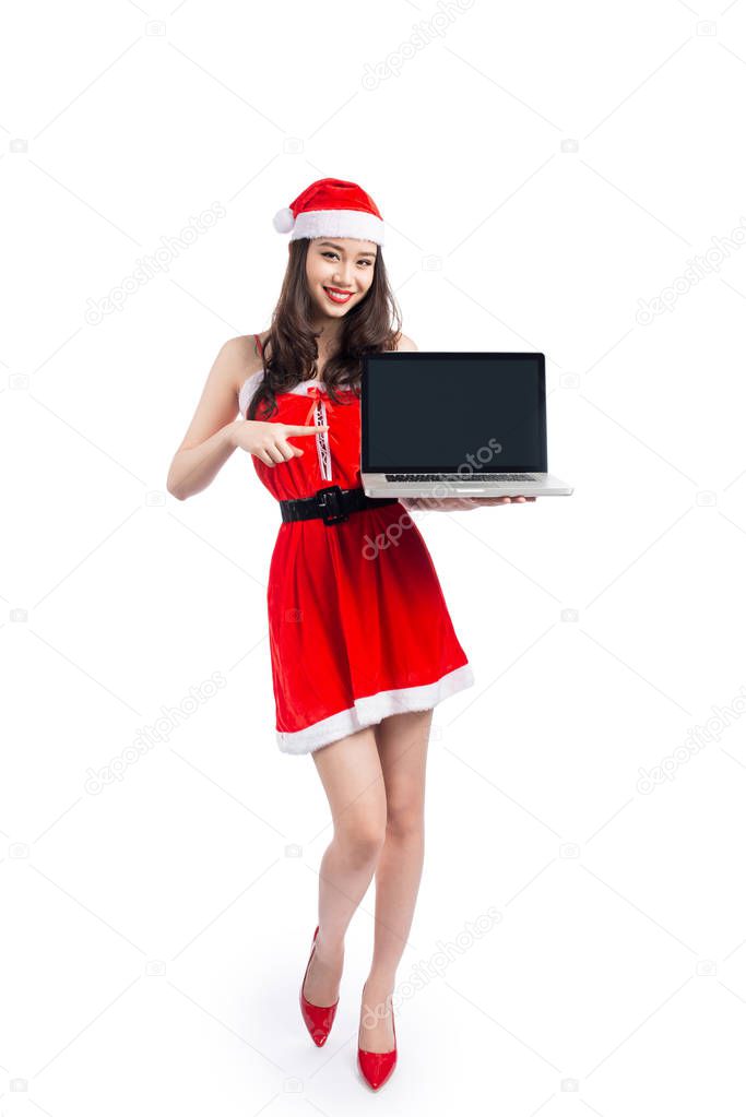 Asian Christmas girl holding laptop 