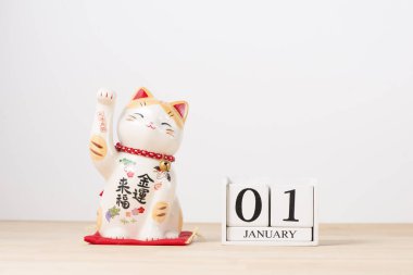 Küp takvim ve Maneki-neko