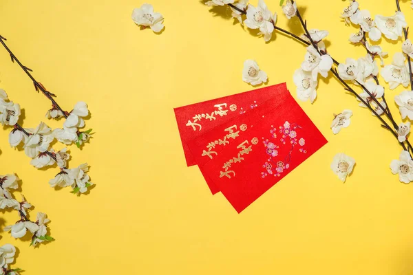 Chinese new year decoration items on yellow background.
