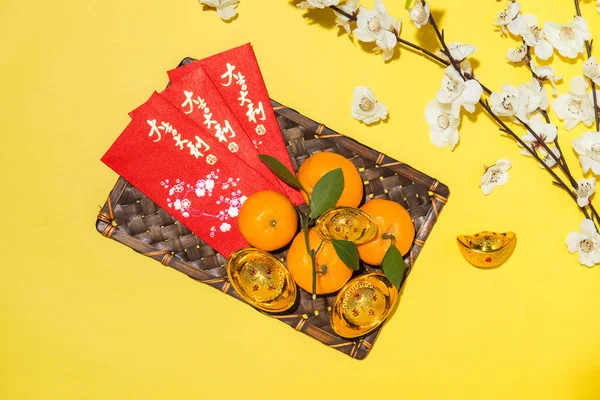 Chinese new year decoration items on yellow background. — Stock Photo, Image