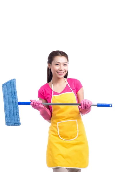 Wanita yang melakukan pekerjaan rumah tangga di rumah terisolasi dengan latar belakang putih — Stok Foto