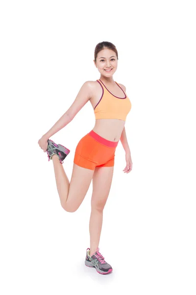 Fitness kobieta robi ćwiczenia rozciągające — Zdjęcie stockowe