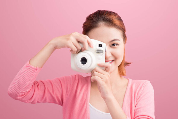 Young woman taking a phot