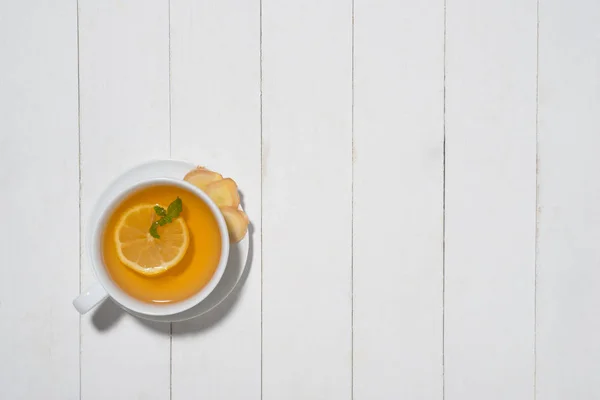 Xícara de chá de gengibre com limão e mel — Fotografia de Stock