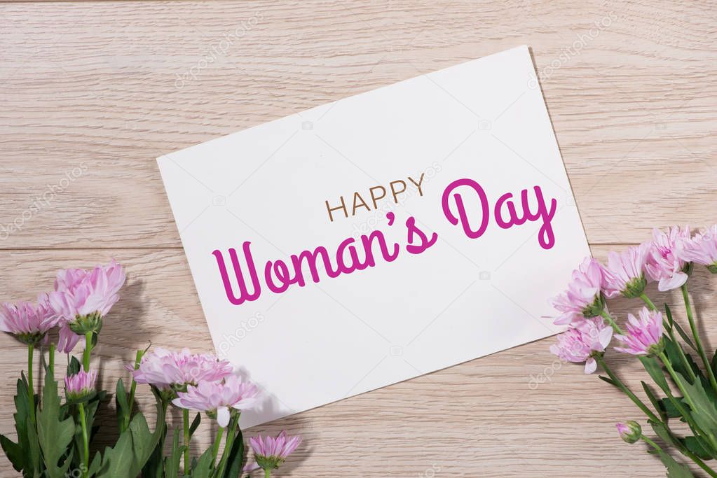 Womans Day tag paper with color flowers