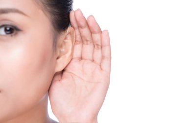 Ear and hand of woman close up clipart