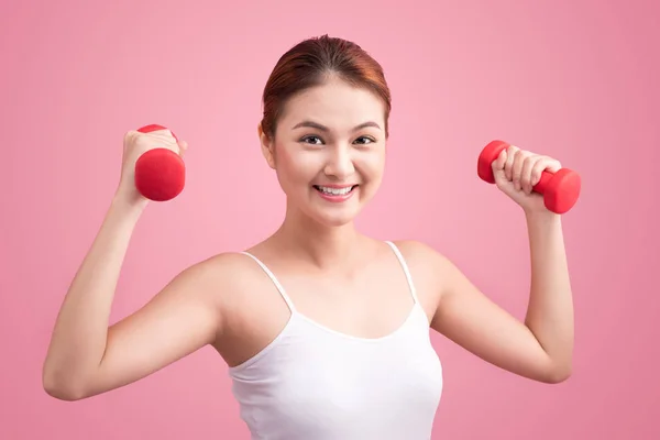 Fitness vrouw tillen gewichten — Stockfoto