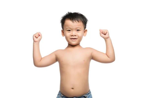 Chlapec ukazuje svaly — Stock fotografie