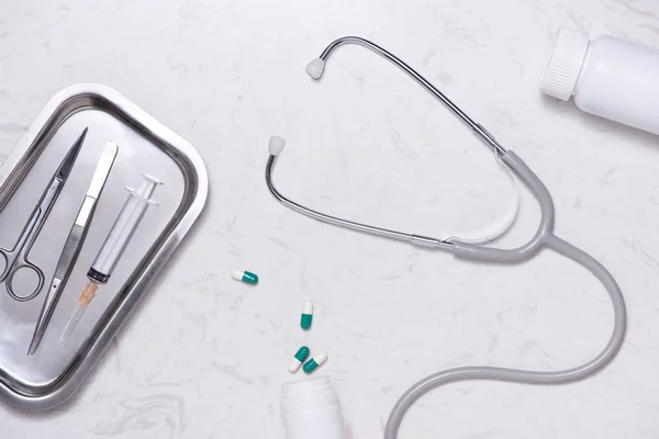 Stethoscope, clipboard, pills — Stock Photo, Image