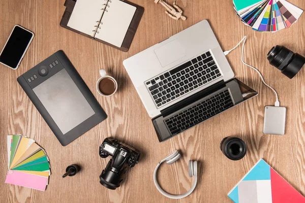 Laptop, camera, headset and coffee cup — Stock Photo, Image