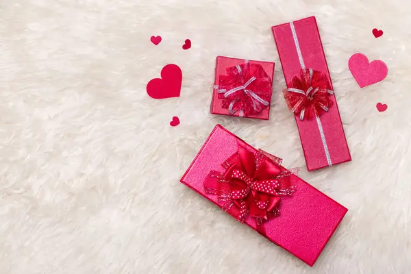 Red gift boxes with bows — Stock Photo, Image