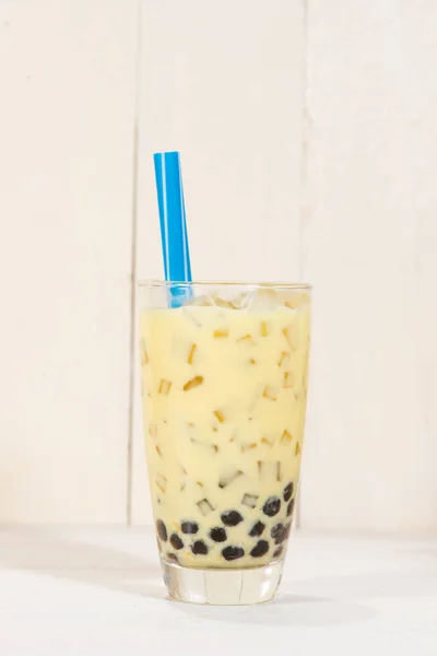 Milk tea with ice cubes