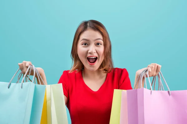 Woman holding shopping bags — Stock Photo, Image