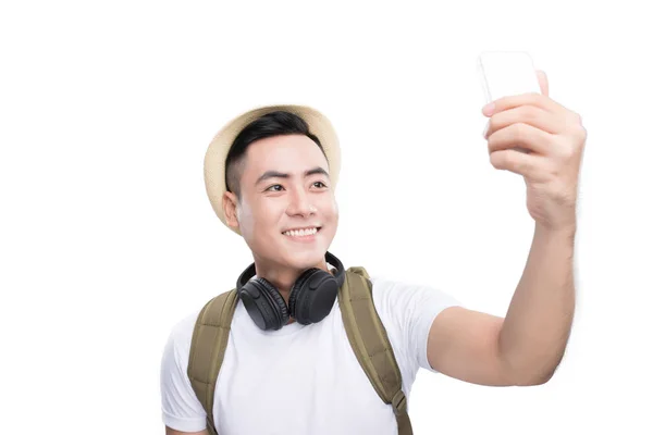 Hombre joven en sombrero con mochila —  Fotos de Stock