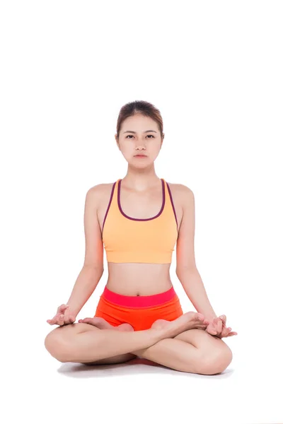 Woman sitting in lotus position — Stock Photo, Image