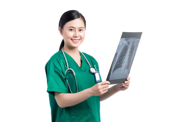 Female doctor looking x-ray — Stock Photo, Image