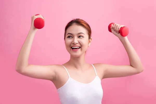 Fitness vrouw tillen gewichten — Stockfoto
