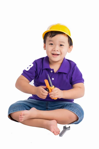 Niño en hardhat con herramientas — Foto de Stock