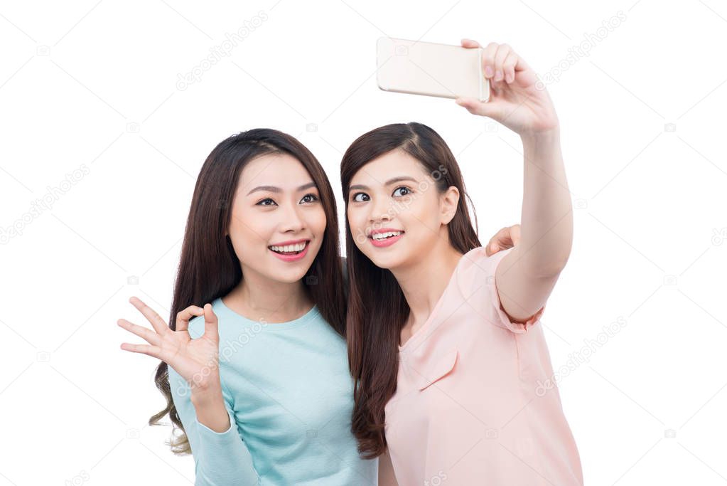 women taking self portrait