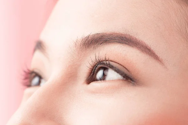 female eyes with long eyelashes