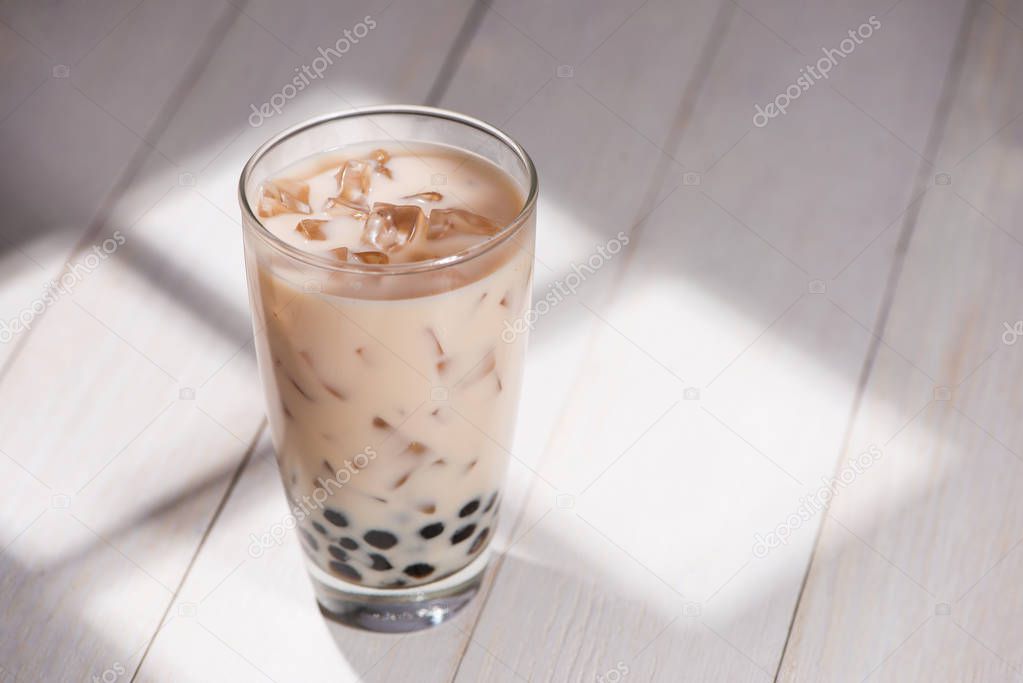 Milk tea with ice cubes