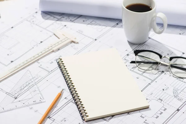 Construction projects. Planning. Open blueprints with a pencil a — Stock Photo, Image