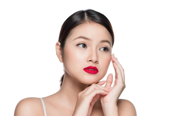 Thoughtful girl touching her face — Stock Photo, Image