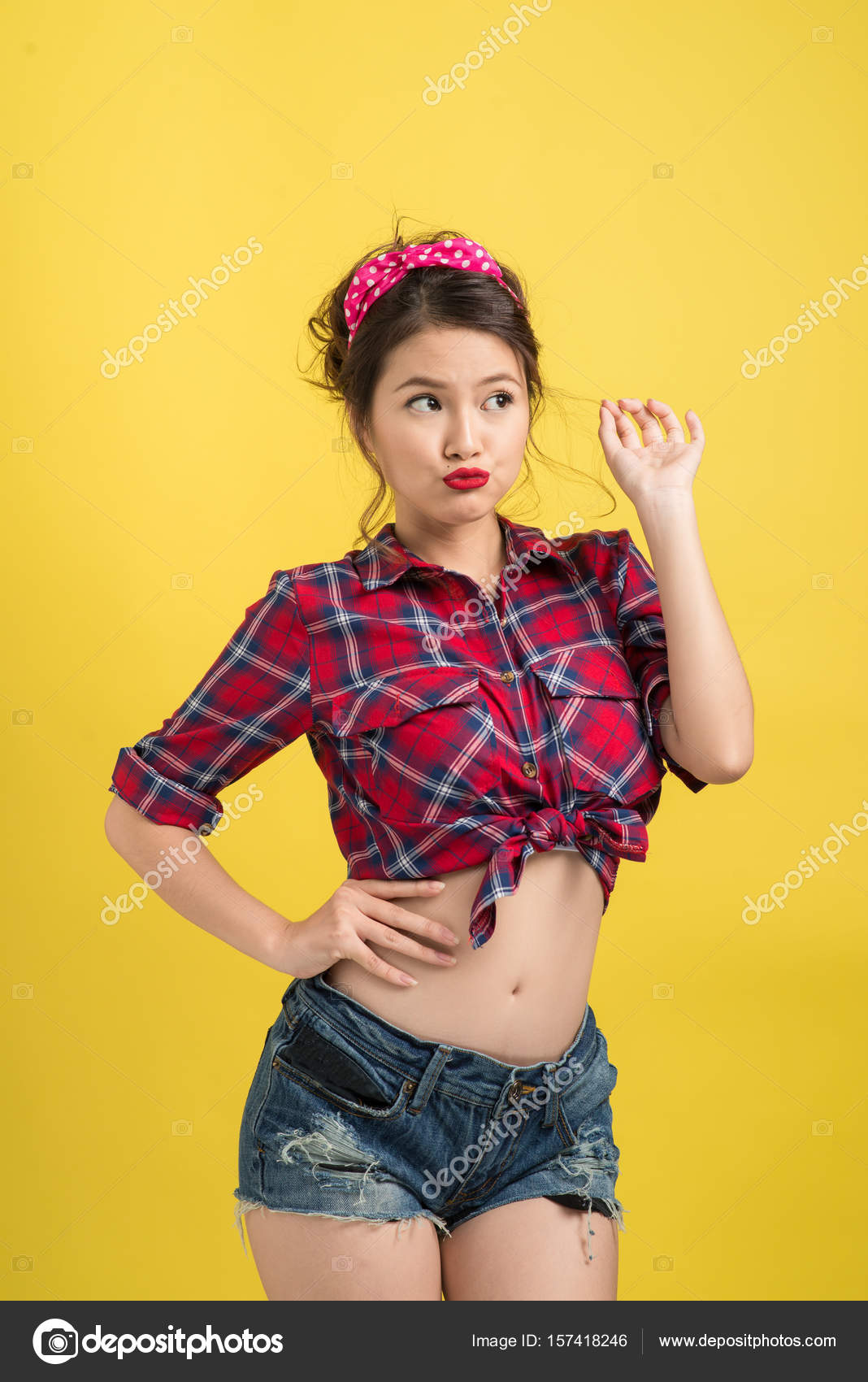 Asian woman with pin-up make-up Stock Photo by ©makidotvn 157418246