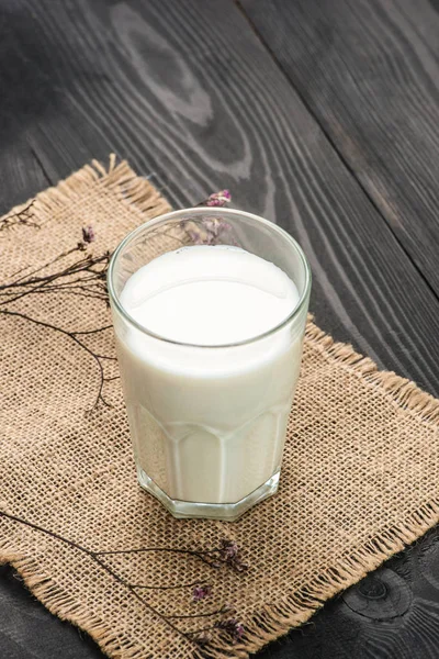 Glass of milk on table — Stock Photo, Image
