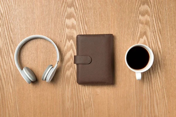 Notepad, headphones and coffee — Stock Photo, Image