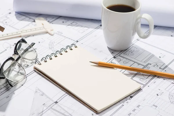 Open blueprints with pencil — Stock Photo, Image