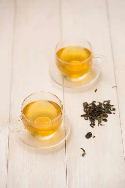 Té negro en taza de vidrio — Foto de Stock