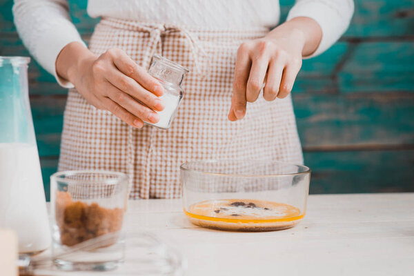 woman making cake.