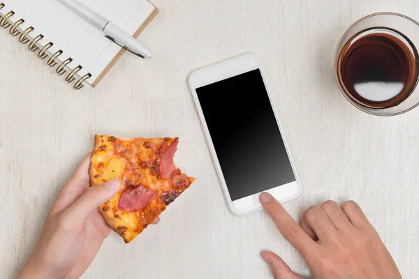 Hands ordering pizza with device