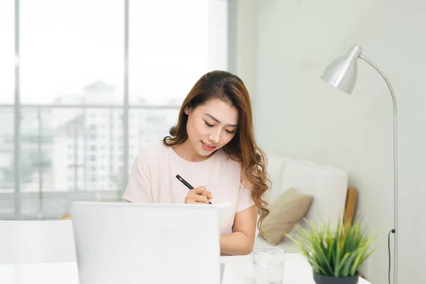 Girl with laptop at home — Stock Photo, Image