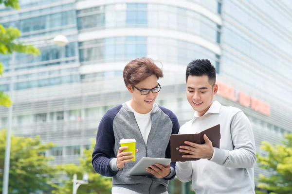 Cheerful business men talking Royalty Free Stock Images