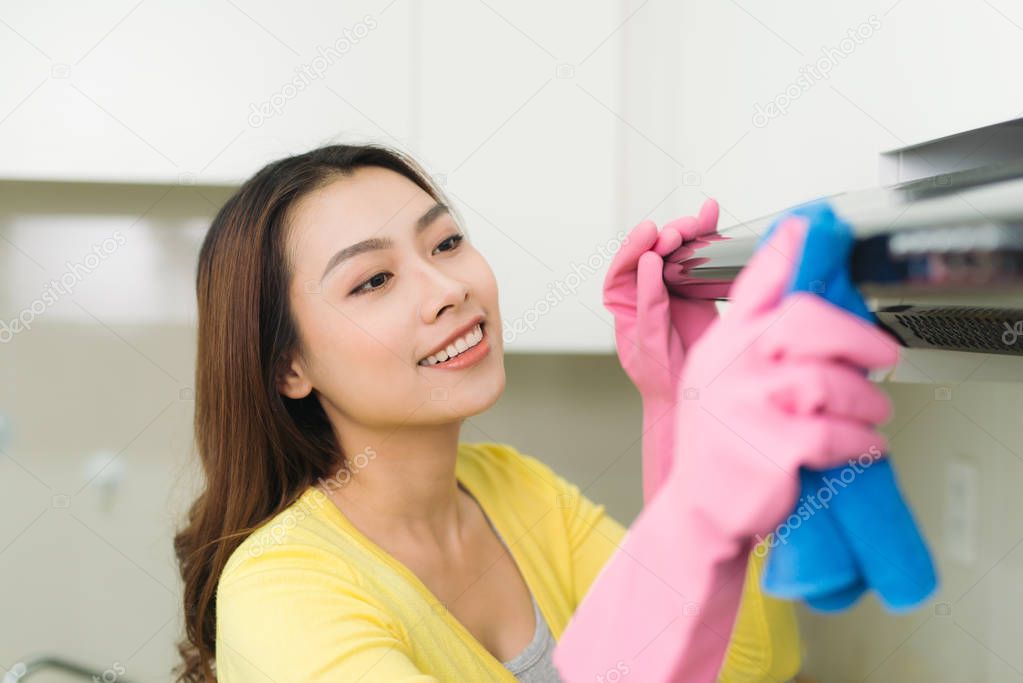 housewife cleaning kitchen