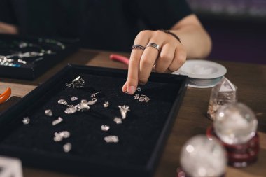 designer making jewelries clipart