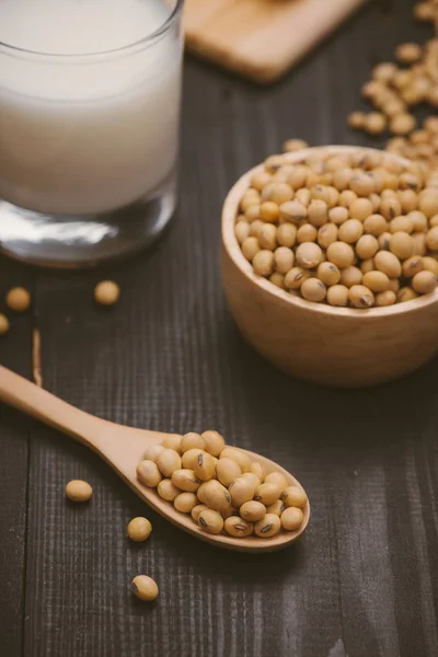 Glass with soy milk and beans — Stock Photo, Image