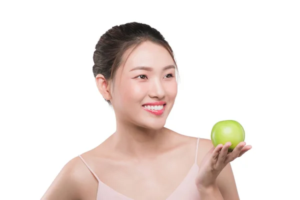 健康的な歯を持つ笑顔の女性グリーンアップルを保持 — ストック写真