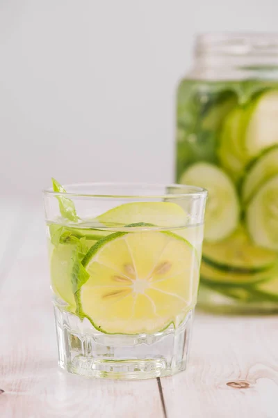 Detox water with vegetables and fruits. Diet healthy eating and weight loss.