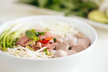 bowl of traditional Vietnamese Pho noodles clipart