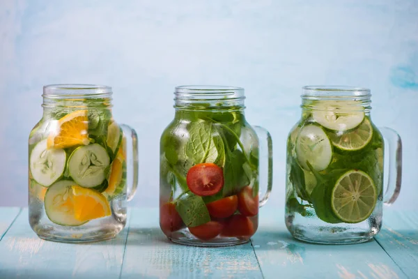 Detox water with vegetables and fruits. Diet healthy eating and weight loss.