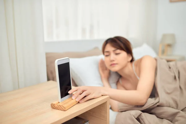 Annoying Alarm Woman Lying Bed Being Woken Mobile Phone Turning — Stock Photo, Image