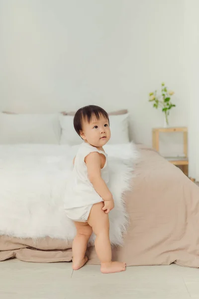 Cute Toddler Girl Standing Bed Smiling Looking Camera Apartment — Stock Photo, Image