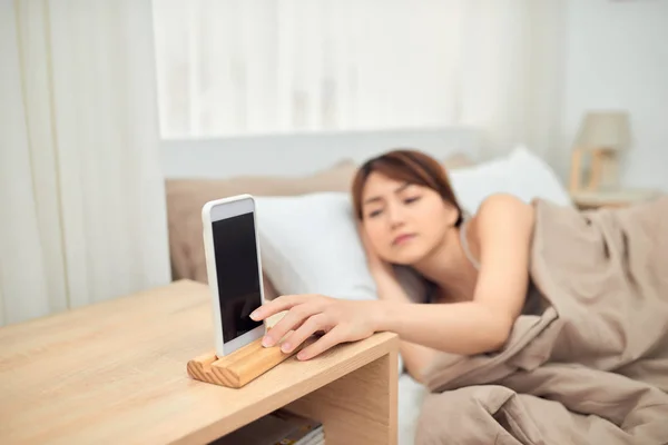 Annoying Alarm Woman Lying Bed Being Woken Mobile Phone Turning — Stock Photo, Image